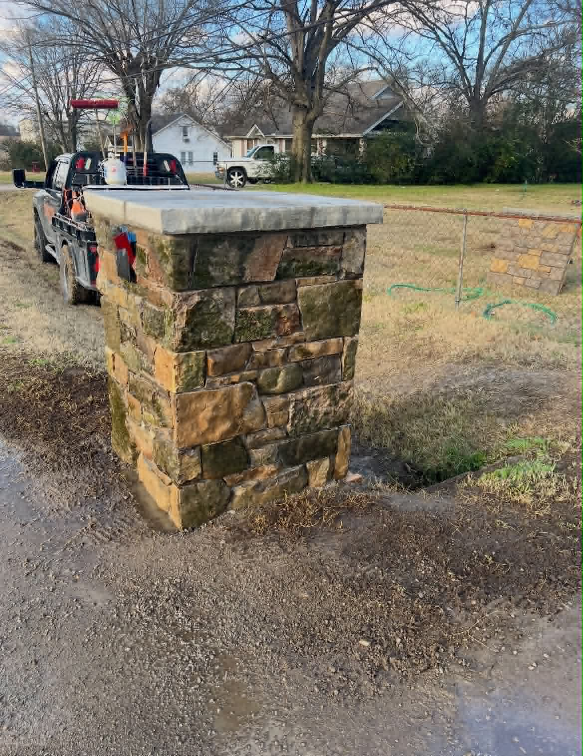 Stone mailbox column built with large natural stone pieces